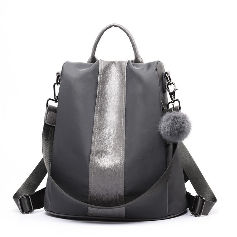 Gray sheepskin patchwork mini chain shoulder bag with pompom and adjustable strap for women