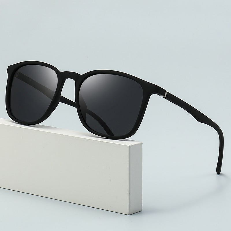 Men's elastic paint polarized sunglasses with black PC frame and UV400 protection