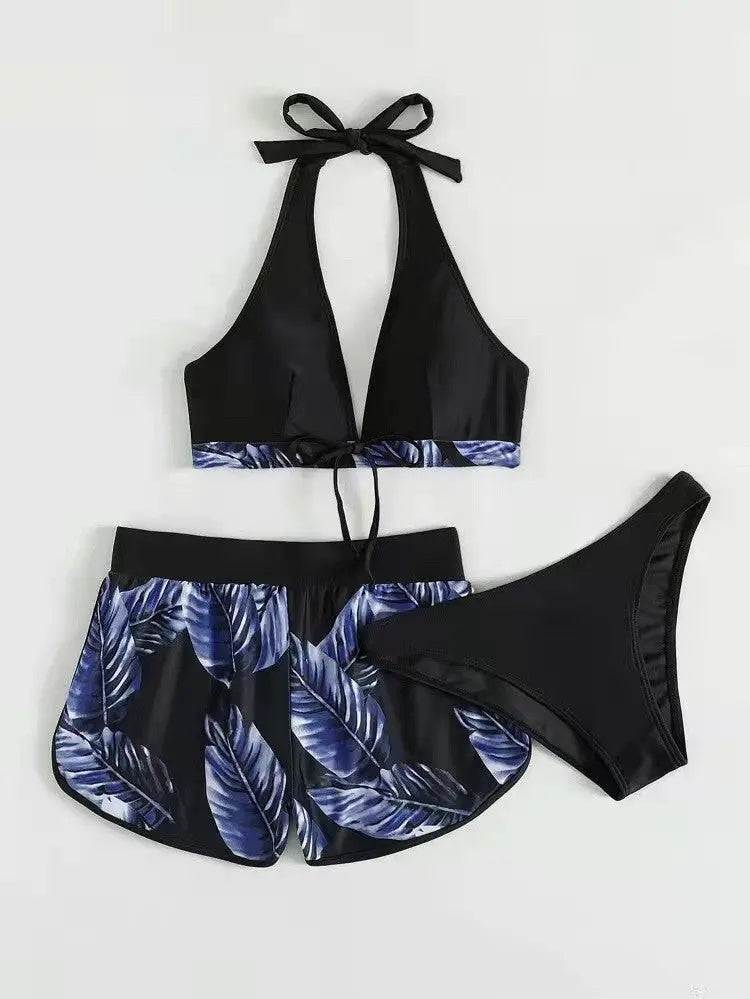 3-piece women's leaf print bikini set with black halter top, matching shorts, and bikini bottoms for summer beachwear