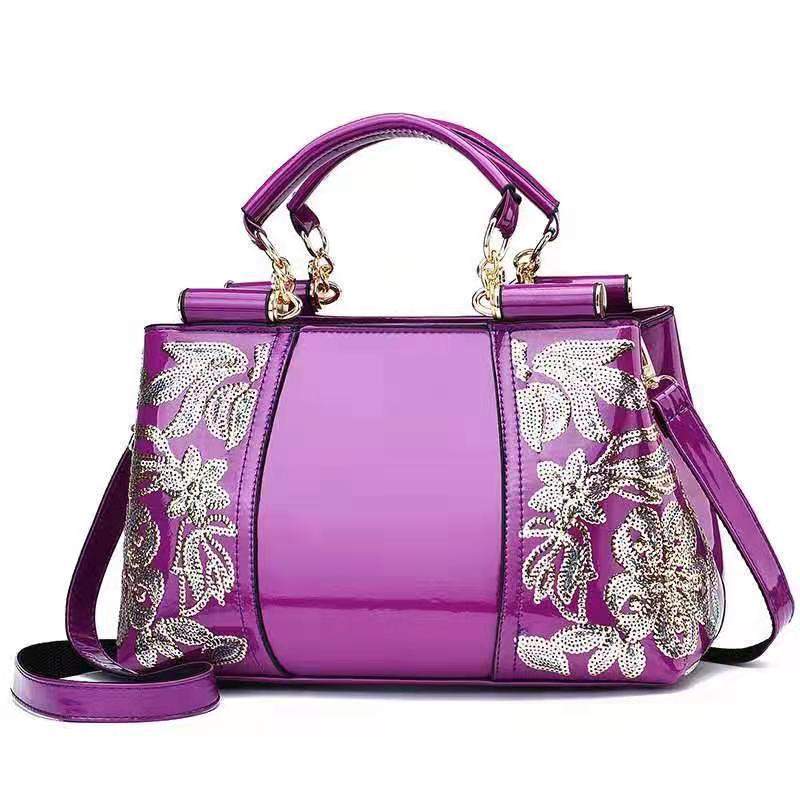 Purple fashion sequins handbag for women with floral embroidery and shoulder strap for party or wedding.