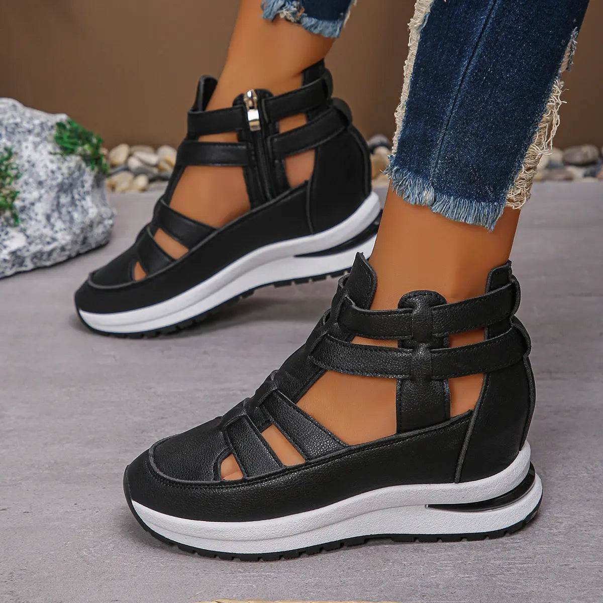 Black women's close-toed hollow-out platform sandals with Velcro strap and rubber sole