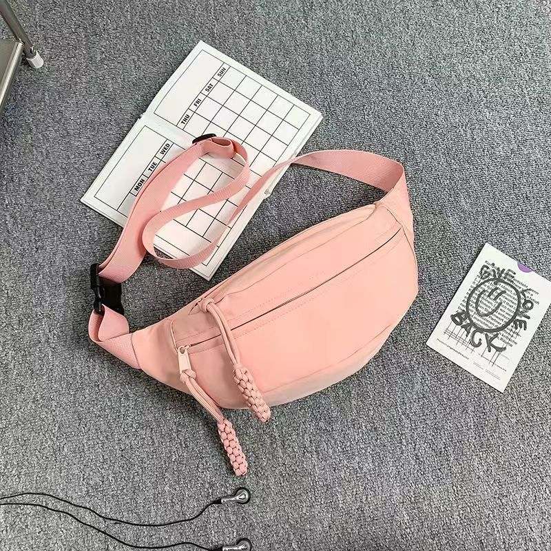 Men's small pink chest bag sports crossbody with polyester material and adjustable strap