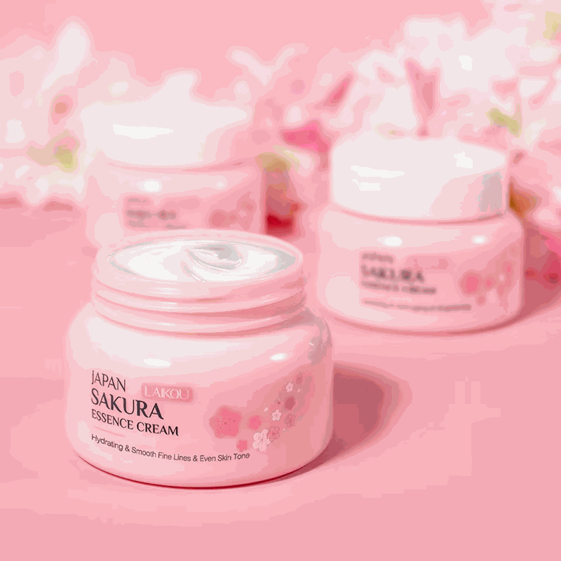 Skinkare Japonaise Laikou Sakura essence cream in pink jar with cherry blossom design on pink background
