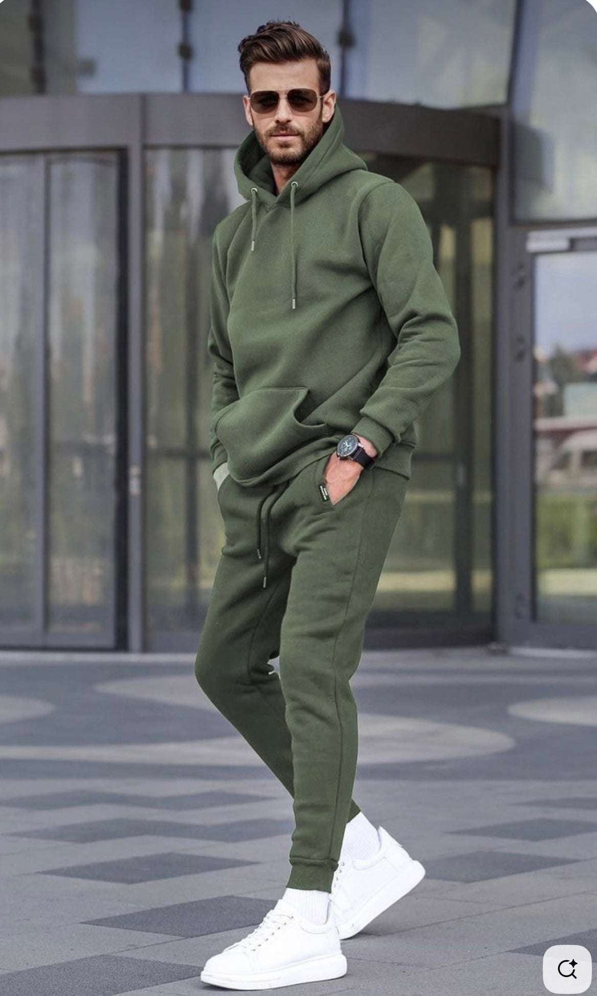 Manfinity Homme men's olive green letter printed hoodie and drawstring waist sweatpants two-piece set with white sneakers worn by model