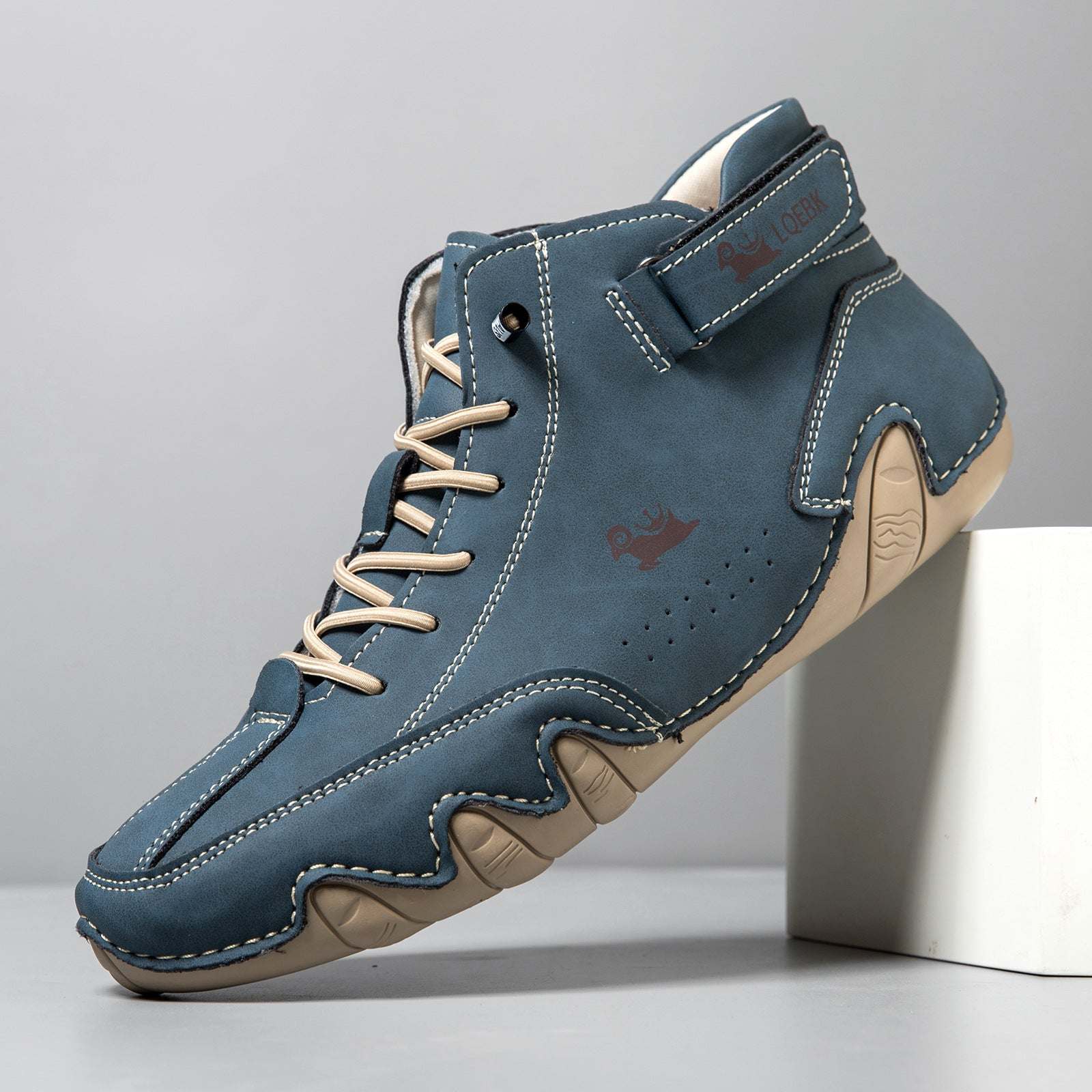 High-top Octopus men's casual Martin boot in dark blue microfiber with beige rubber sole and stitching details