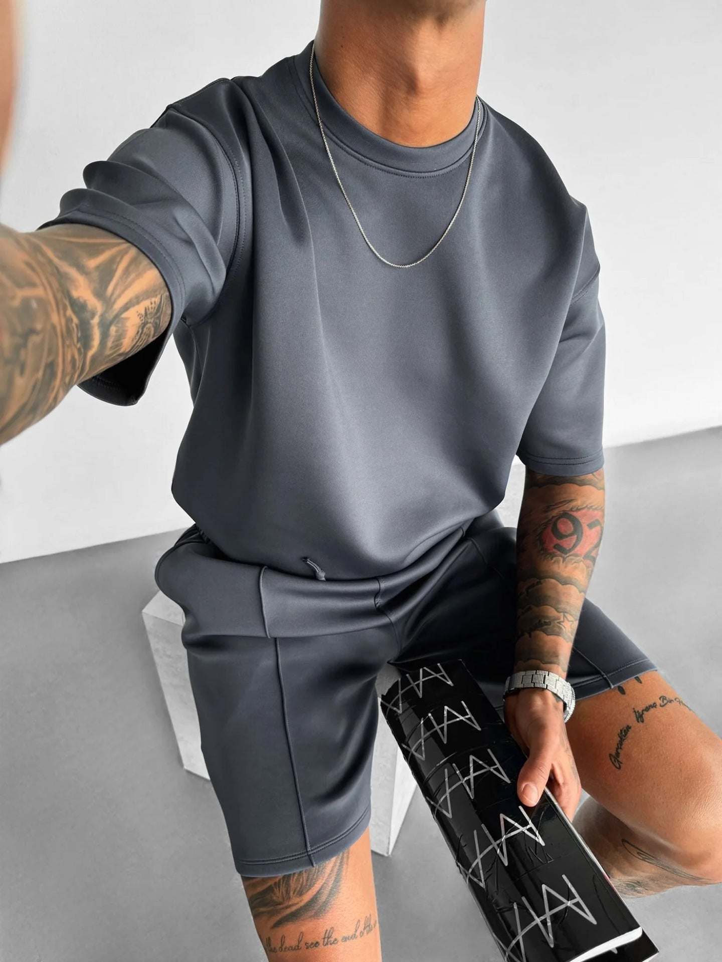 summer men's short sleeve polyester sports shorts suit in dark gray