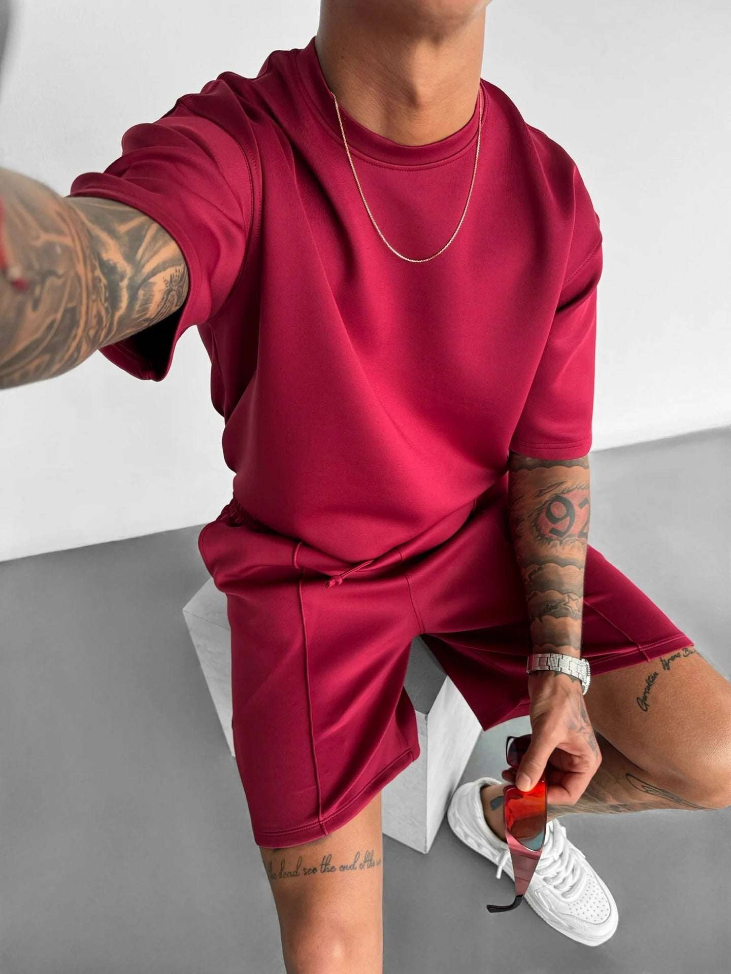 Summer men's short sleeve sports suit in wine red with shorts and T-shirt style top