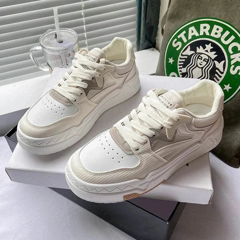 Fashion small white women's sneakers with thick soles and lace-up closure on box