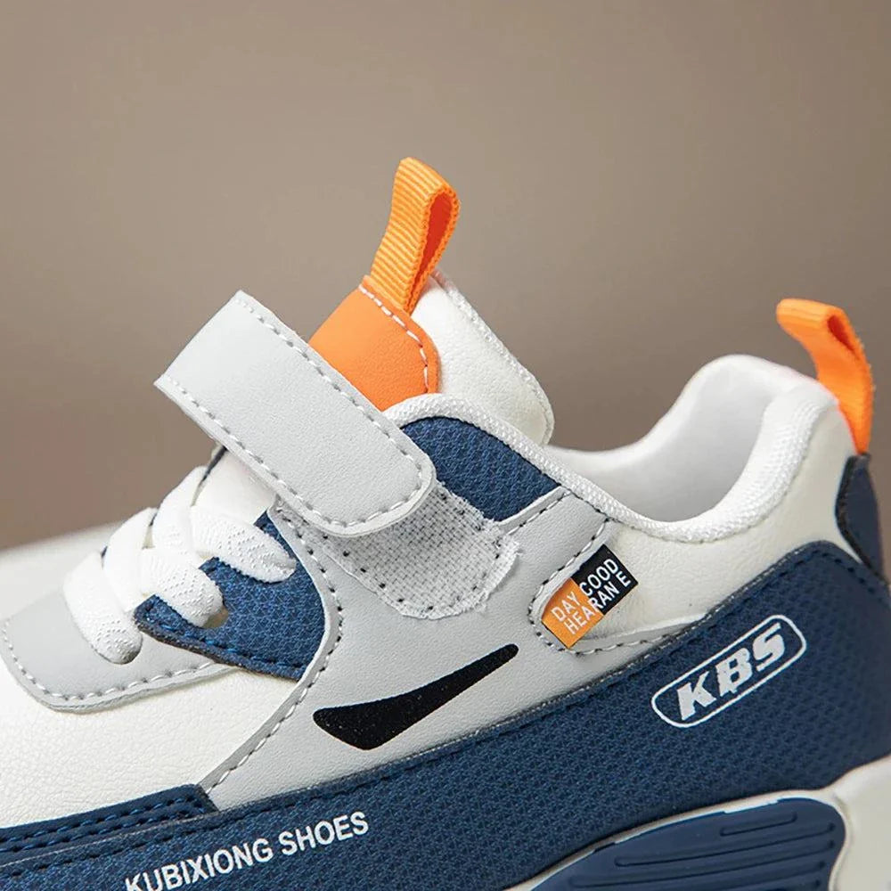 PU leather sport shoes for children with hook and loop closure in blue, white, and orange colors, soft sole, and anti-slippery outsole