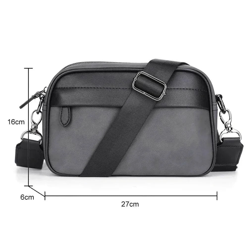 Black PU leather business shoulder bag for men with adjustable strap and zipper closure, 27x16x6cm compact design.