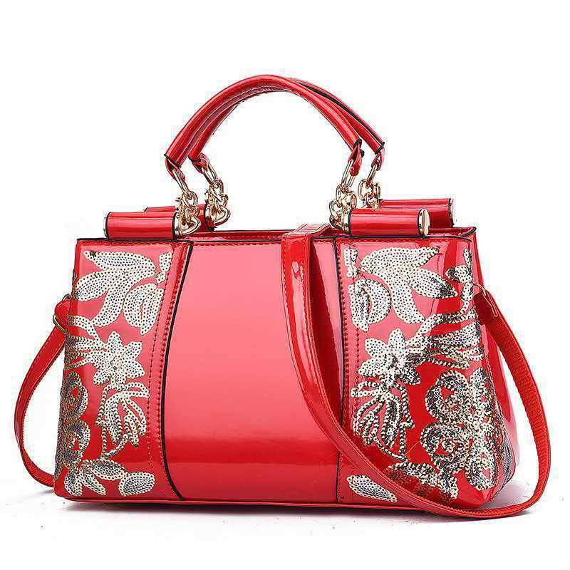 Red fashion sequins handbag for women with shoulder strap and floral embroidery for party and wedding use