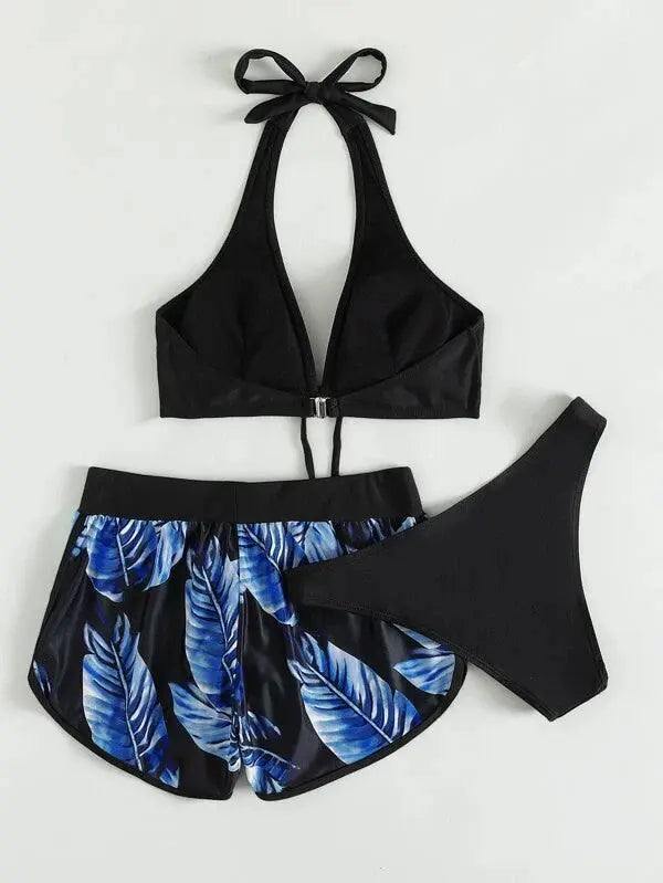 3pcs leaf print bikini set with black halter top, blue leaf print shorts, and black bikini bottoms
