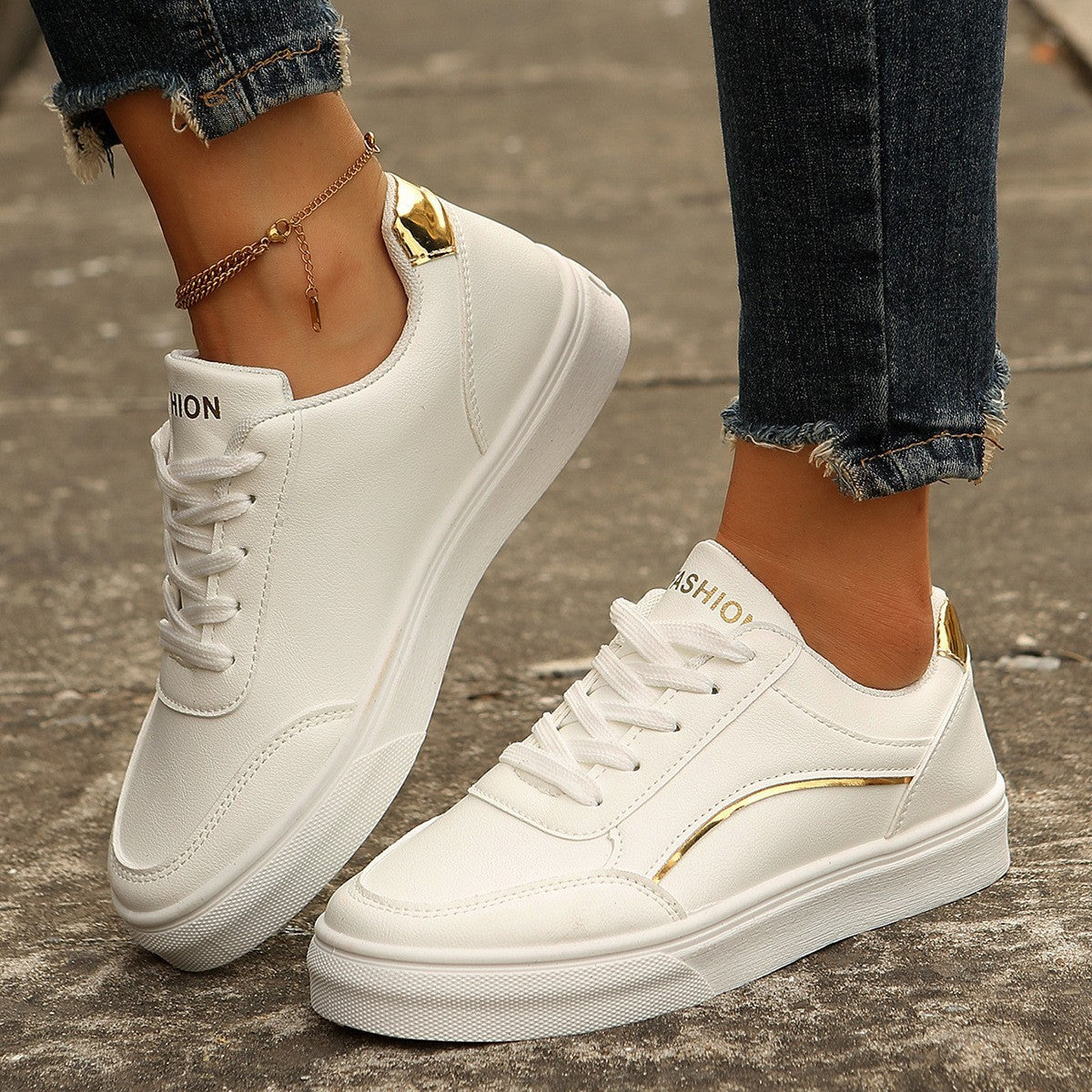 Lace-up white flats with round toe and thick sole, casual women's shoes with gold accents and slip-on design