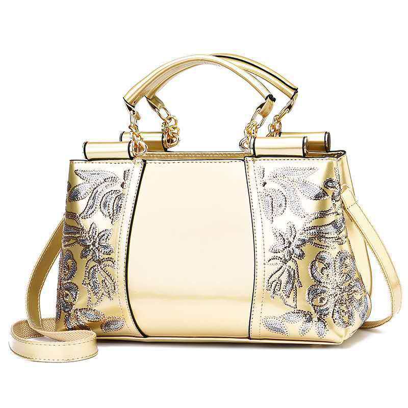 Fashion sequins handbag for women with gold PU material, floral embroidery, and shoulder strap for party and wedding use