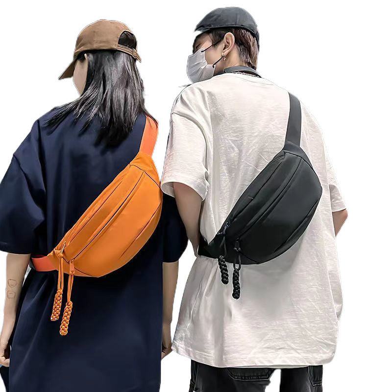 Men's small chest bag shoulder sports crossbody bag in black and orange colors